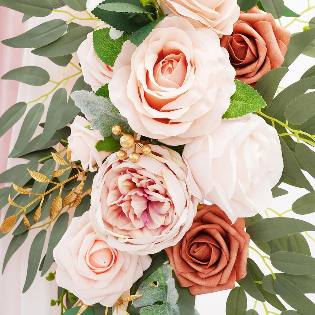 Pink ceremony arch flowers and drapes