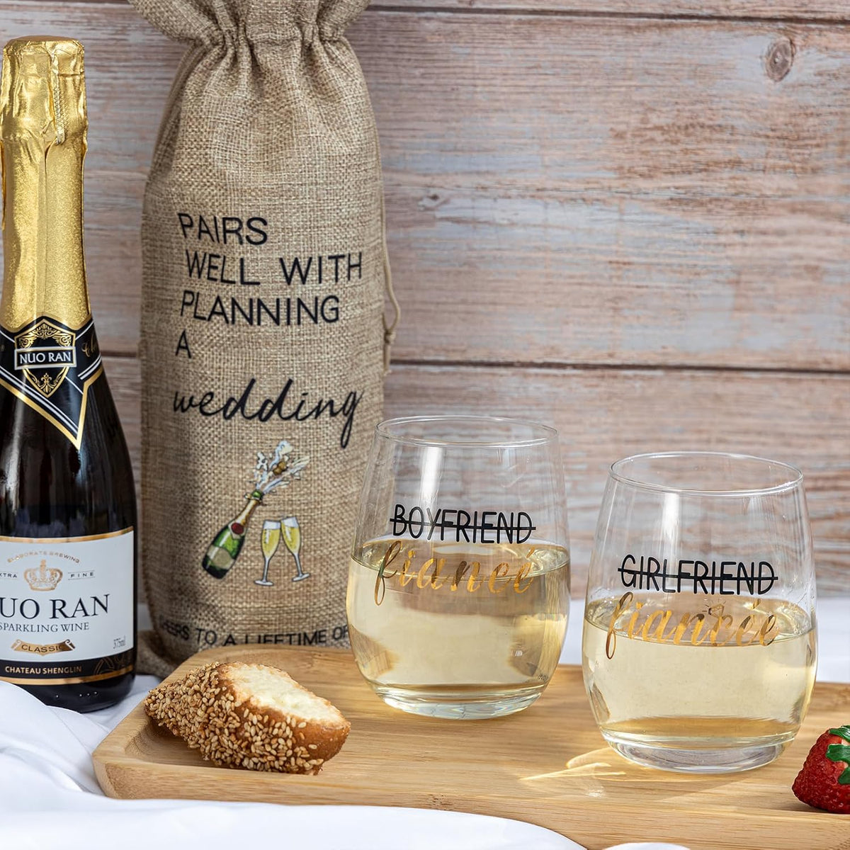 Stemless wine glasses and gift bag for engagement celebration