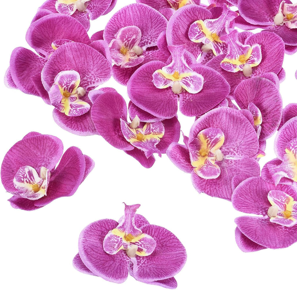 Dark purple artificial orchid flower heads for event décor