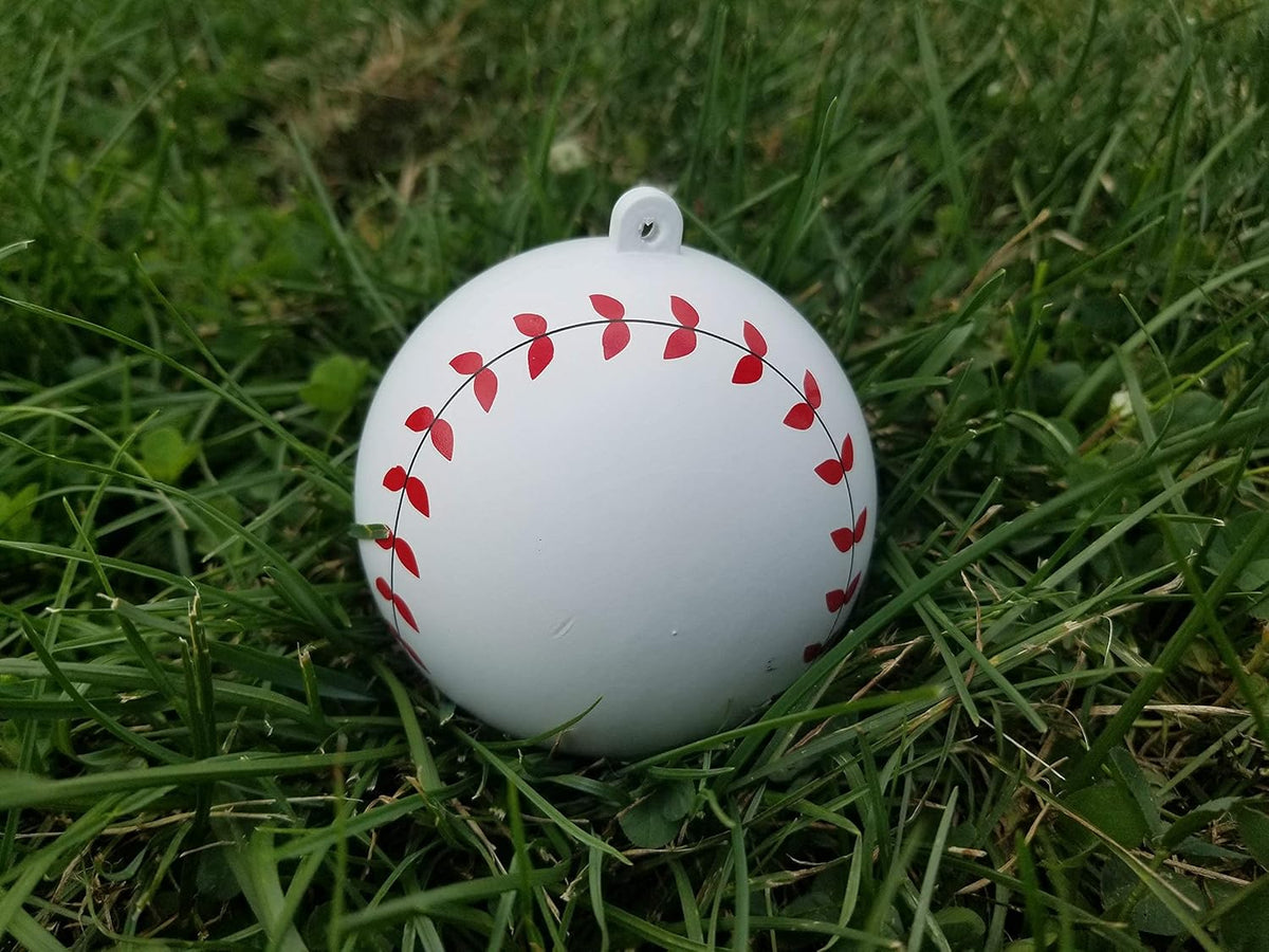 Gender reveal baseball with pink powder