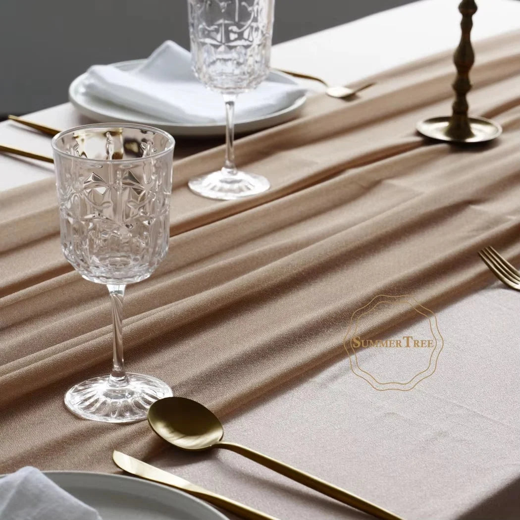 Sheer khaki runner for wedding tables