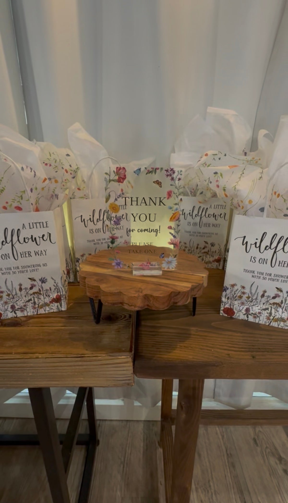 Coordinated wildflower guest favors for a Pinopoles event