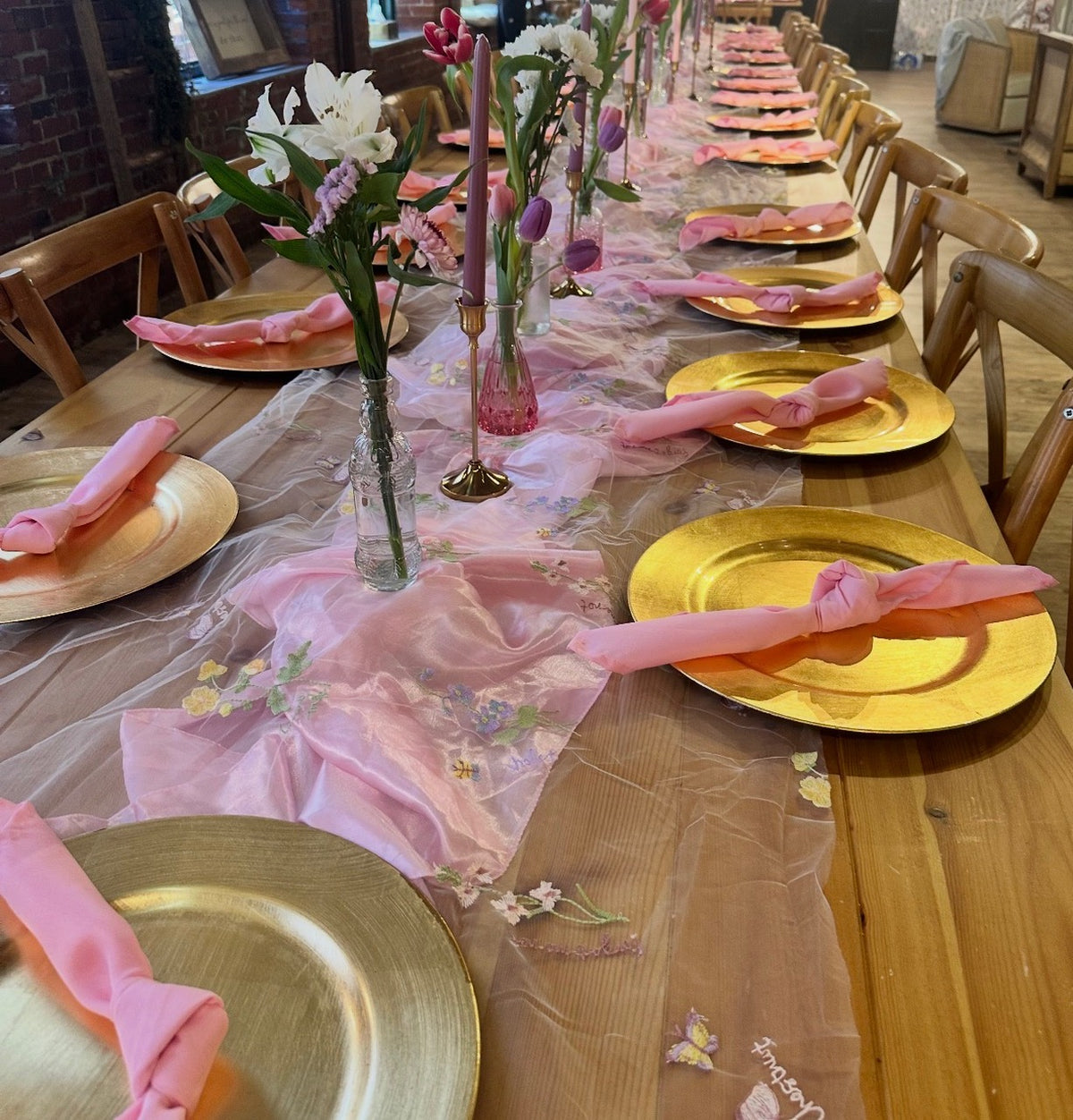 Pink and gold tablescape styled by Pinopoles