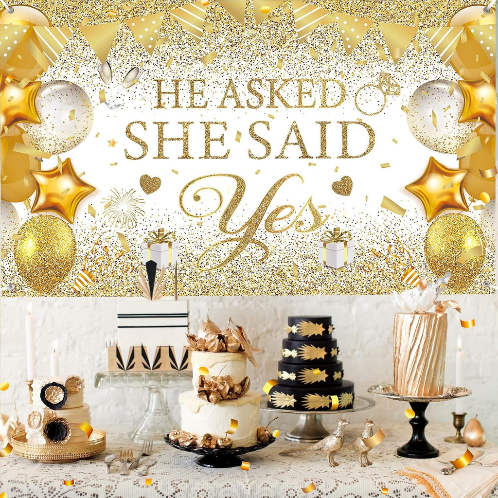 White and gold engagement party photo backdrop